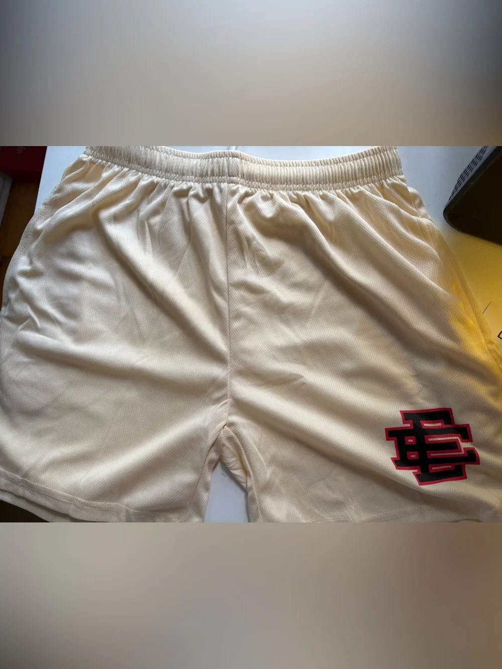 Eric Emanuel Cream Athletic Shorts with Black & Red Logo